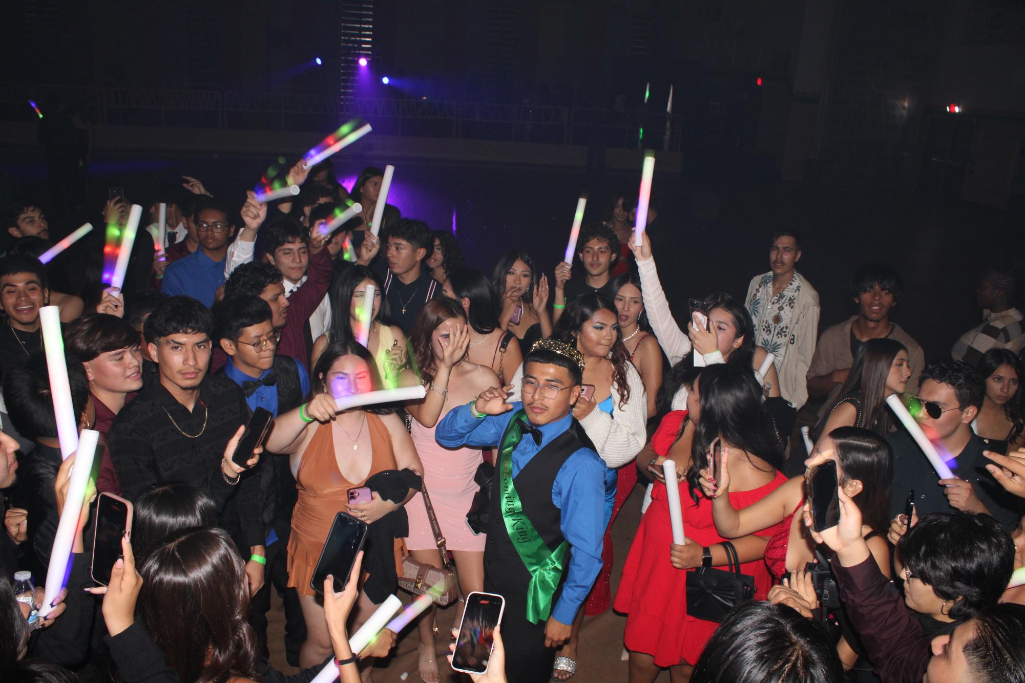 Homecoming King Gerry Ojeda in the center of a mosh pit.